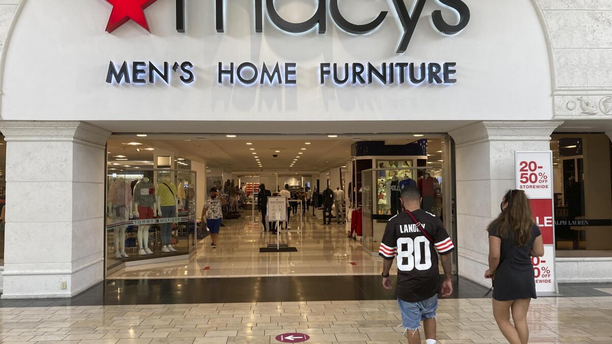 Macy s slashes expectations for the year after a pullback by